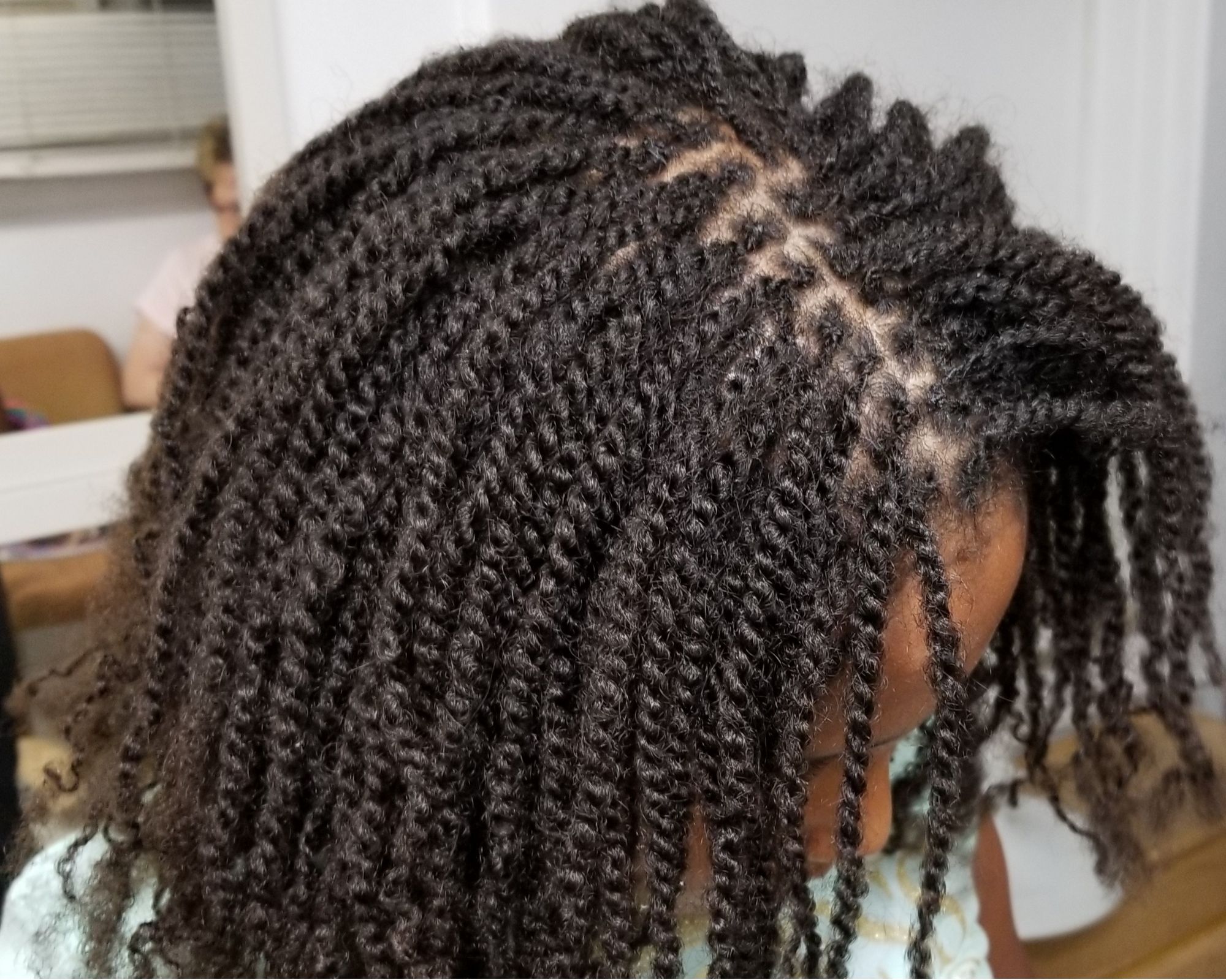 Girl with two strand twist locs